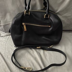 I’m selling my black MK satchel handbag.